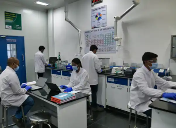 A group of Neuland scientists conducting an engineering assessment of peptides